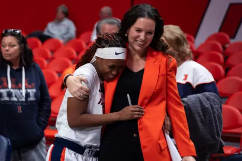 CHAMPAIGN, IL - January 28, 2024 - Illinois Guard Genesis Bryant (#1) and Illinois Head Coach Shauna Green after the game between the Minnesota Golden Gophers and the Illinois Fighting Illini at State Farm Center in Champaign, IL. Photo By Kevin Snyder