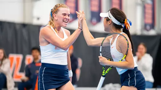 URBANA, IL - March 01, 2024 - Illinois’s Megan Heuser and Illinois’s Alice Xu during the match between the Washington Huskies and the Illinois Fighting Illini at Atkins Tennis Center in Urbana, IL. Photo By Kevin Snyder