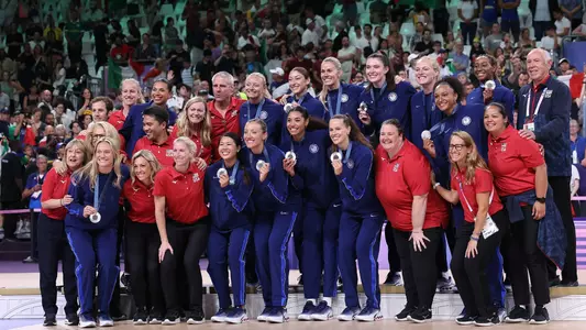 PARIS, FRANCE - AUGUST 11: Silver medalists Team United States pose on the podium during the Medal Ceremony after the Women's Gold Medal match between Team United States and Team Italy on day sixteen of the Olympic Games Paris 2024 at Paris Arena on August 11, 2024 in Paris, France. (Photo by Ezra Shaw/Getty Images)