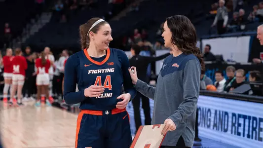 Minneapolis, MN - March 07, 2024 - Illinois Forward Kendall Bostic (#44) and Illinois Head Coach Shauna Green before the Big Ten Tournamanet game between the Maryland Terrapins and the Illinois Fighting Illini at Target Center in Minneapolis, MN. Photo By Madison Dabrowski
