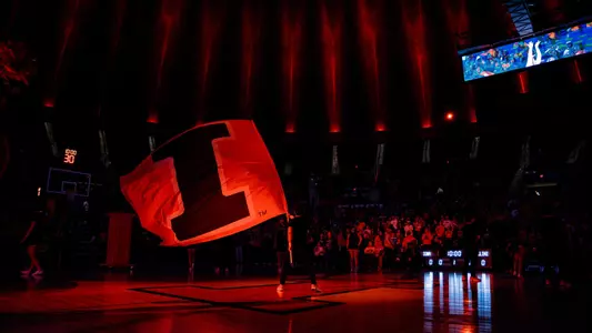 Cheer flag team State Farm Center orange