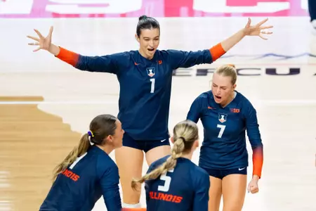 NORMAL, IL - September 14, 2025 - Opposite Hitter Auburn Tomkinson (#1), Setter Kenna Phelan (#7) during the game between the Illinois State Redbirds and the Illinois Fighting Illini at CEFCU Arena in Normal, IL. Photo by Ashley Ray/Fighting Illini