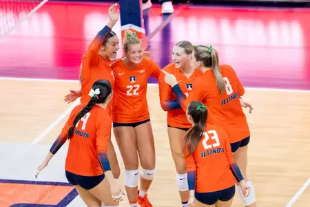 CHAMPAIGN, IL - September 21, 2025 - Middle Blocker Kayla Burbage (#9), Opposite Hitter Ava Wysocki (#22), \vb10 during the match between the Eastern Illinois Panthers and the Illinois Fighting Illini at Huff Hall in Champaign, IL. Photo By Ashley Ray/Fighting Illini