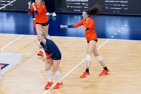 CHAMPAIGN, IL - September 21, 2025 - Libero/Defensive Specialist Taryn Kirsch (#2), Opposite Hitter Auburn Tomkinson (#1) during the match between the Eastern Illinois Panthers and the Illinois Fighting Illini at Huff Hall in Champaign, IL. Photo By Ashley Ray/Fighting Illini
