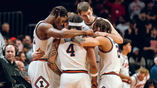 Men's basketball huddle at Rutgers - 2-5-25 (Courtney Bay)
