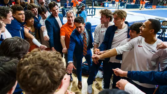 Team huddle vs. Nebraska