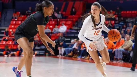 CHAMPAIGN, IL - November 30, 2025 - Guard Mia Zenere (#12) during the game between the Le Moyne Dolphins and the Illinois Fighting Illini at State Farm Center in Champaign, IL. Photo By Ashley Ray/Fighting Illini