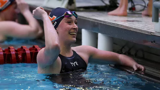 Maggie Adler smiling after a swim