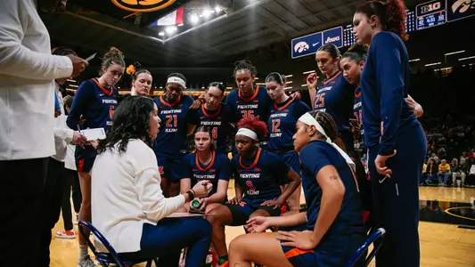 Team huddle at Iowa Shauna Green