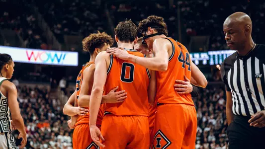 Huddle at #10 Michigan State (Courtney Bay)