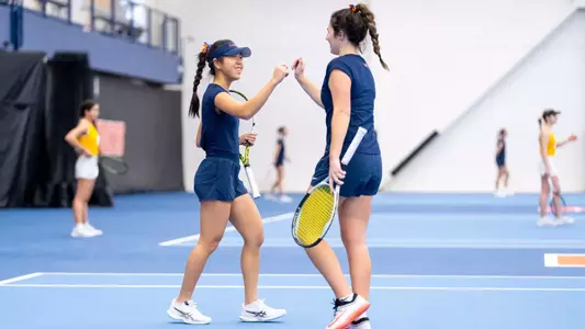 CHAMPAIGN, IL - March 02, 2026 - Alice Xu, Tess Bucher during the match between the UMKC Kangaroos and the Illinois Fighting Illini at Atkins Tennis Center in Champaign, IL. Photo By Ashley Ray/Fighting Illini
