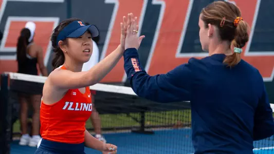 CHAMPAIGN, IL - March 22, 2026 - Alice Xu during the match between the Indiana Hoosiers and the Illinois Fighting Illini at Atkins Tennis Center in Champaign, IL. Photo By Ryan Shepardson / Fighting Illini