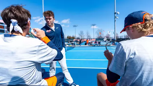 CHAMPAIGN, IL - April 05, 2026 - Assistant Coach Lucas Horve during the match between the Purdue Boilermakers and the Illinois Fighting Illini at Atkins Tennis Center in Champaign, IL. Photo By Knox Mynatt/Fighting Illini