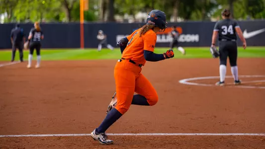 Adisyn Caryl runs to first base
