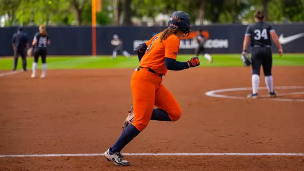 Adisyn Caryl runs to first base