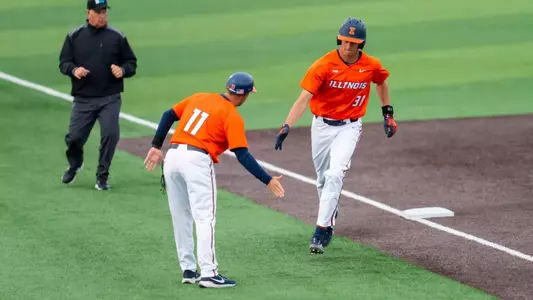 CHAMPAIGN, IL - April 28, 2026 - Assistant Coach Adam Christ, Outfielder Collin Jennings (#38) during the game between the Roosevelt University Lakers and the Illinois Fighting Illini at Illinois Field in Champaign, IL. Photo By Ashley Ray/Fighting Illini