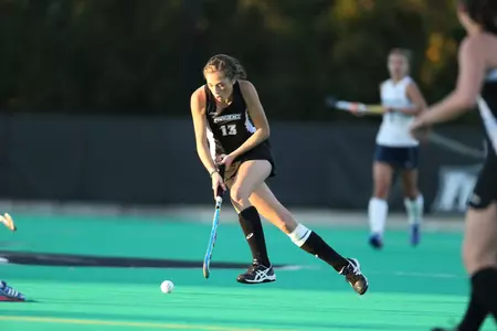 Field Hockey forward Adrienne Houle does a pull dodge during gameplay at Lennon Family Field.