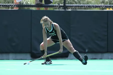 Emily Humiston inserts a ball during a corner in a field hockey game at Lennon Family Field