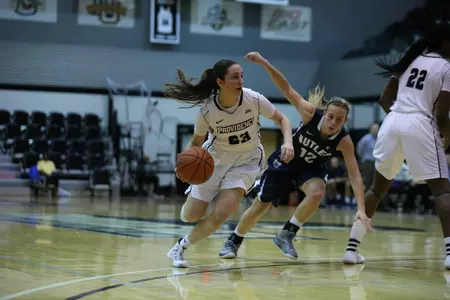 Clara Che drives to the basket during a BIG EAST conference game versus Butler