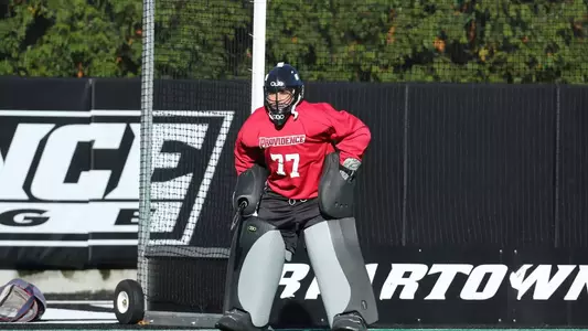 Field Hockey goaltender Lydia Rice is pictured set up in the goal during a game at Lennon Family Field.