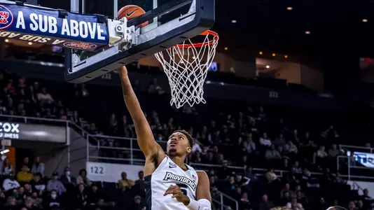 Ed Croswell with a layup.