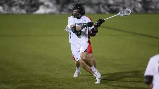 Dan Axelson winding up to take a shot in 2021 game. Photo taken by Stew Milne.