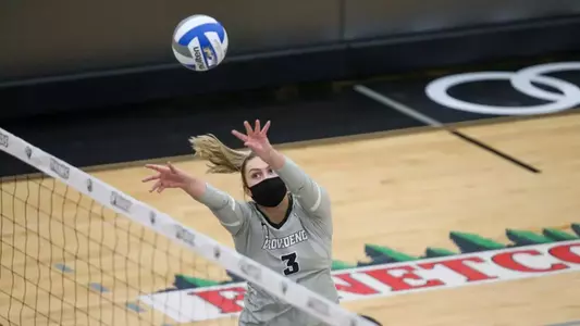 Alison Barber hitting the ball over the net during the 2020 season
