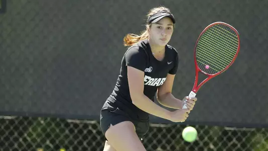 Tennis player Vannelie Melendez prepares to hit the ball forehand during a 2021 match.