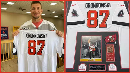 Rob Gronkowski holding an autographed Tampa Bay Buccaneers Super Bowl jersey. Also the same jersey framed for auction.