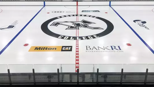 Picture of center ice with the skating Friar logo at Schneider Arena
