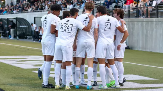 Men's Soccer Team Huddle