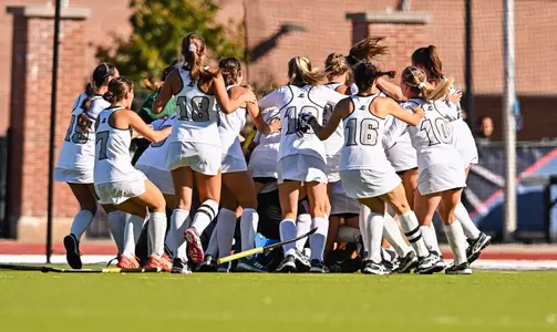 Field Hockey celebration photo following the team's 2-1 double-overtime victory at UConn on Oct. 13