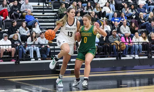 Marta Morales Romero - women's basketball action photo vs. Vermont