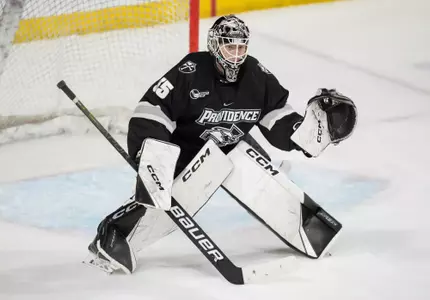Providence College Men's Ice Hockey player Philip Svedeback sets up to defend goal against ASU.