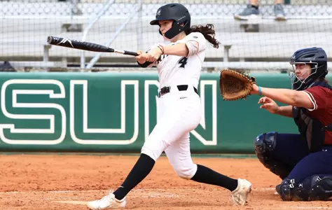 Rachael Petrarca - Softball hitting against FDU