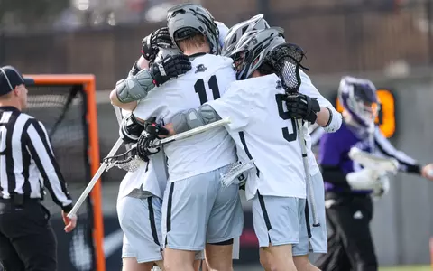 Men's Lacrosse celebratory huddle vs Holy Cross