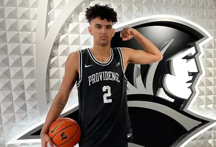 Donovan Santoro posing in the Friar Development Center