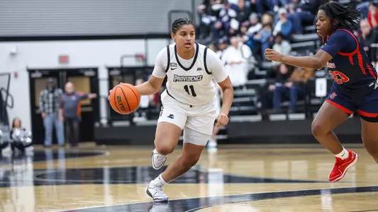 Nariah Scott - women's basketball action photo vs. St. John's