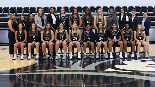 2024-25 Women's Basketball - Team Photo with staff and players
