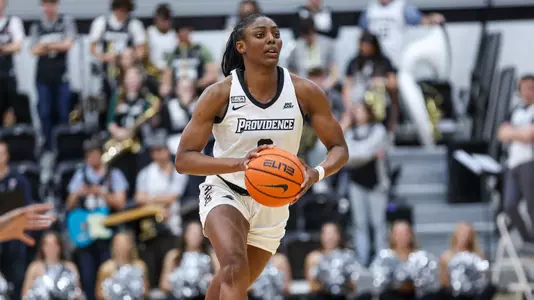Grace Efosa - women's basketball action photo