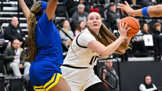 Ugne Sirtautaite - women's basketball action photos vs. Delaware