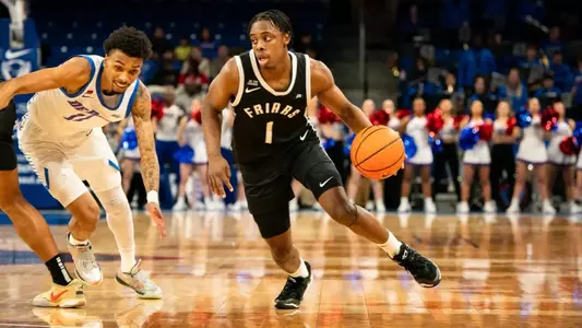 Jayden Pierre Pierre charges the net in game against DePaul at the Amica Mutual Pavilion during the 2024 2025 season