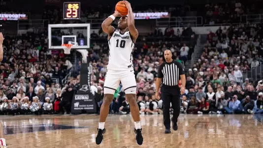 Rich Barron men's basketballn shoots the ball in a game against St. Johns