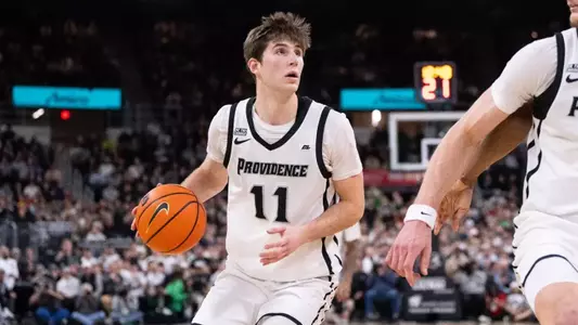 Ryan Mela with possesion of the ball in game against Saint Johns University at the Amica Mutual Pavilion 2025