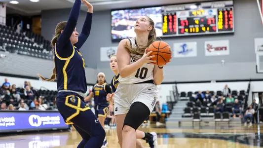 Ugne Sirtautaite - women's basketball action photo