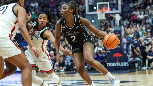 Grace Efosa - women's basketball action photo vs. UConn