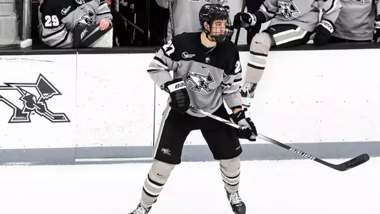 Providence College Men's Ice Hockey player Taige Harding on the ice in game against Colorado College.