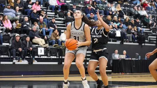 Olivia Olsen - women's basketball action photo vs Xavier
