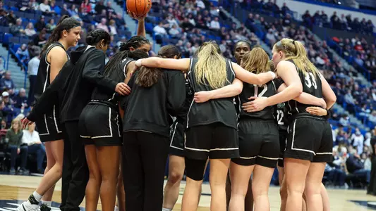 Group Huddle vs. UConn on Feb. 10
