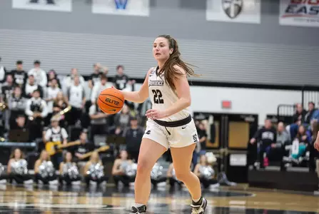 Brynn Farrell dribbles the ball up the court in a BIG EAST basketball game versus Villanova